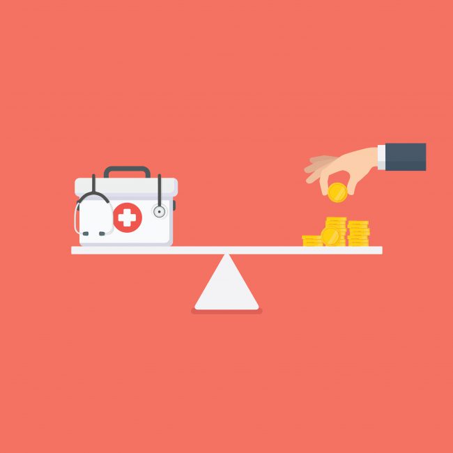 Health care costs or medical insurance, Medical box with stethoscope and stack of money on the scale