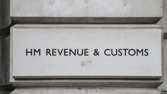 HM Revenue and Customs sign on a building in Whitehall, London, England, UK.
