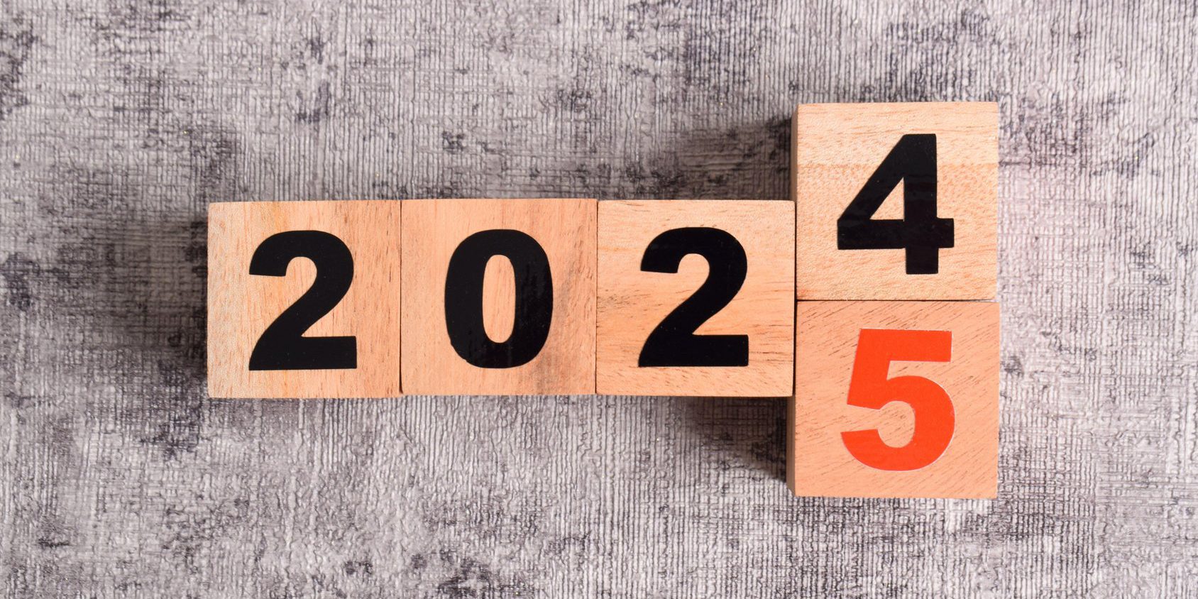 2024 year change to 2025 year on wooden cubes. Annual concept 2024,2025. Plan, goal, trend