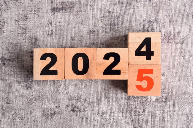 2024 year change to 2025 year on wooden cubes. Annual concept 2024,2025. Plan, goal, trend
